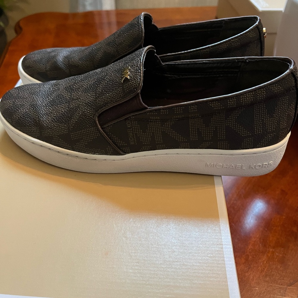 Michael Kors brown leather slip on . Size 8 . Brand new